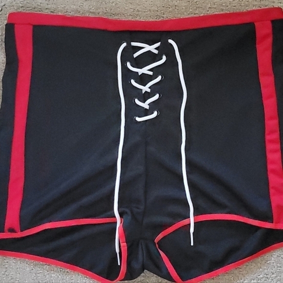 Dolls Kill 1/2 of Cheerleader Costume High Waist Lace Up Two Tone Mini Shorts - Picture 6 of 10